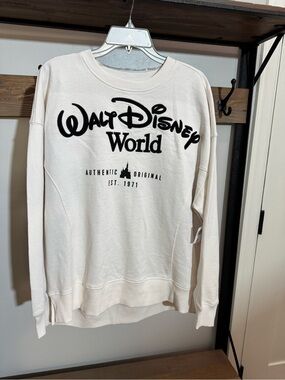 NWT Disney Cream Sweatshirt Black Embroidered “WDW” and dropped back panel